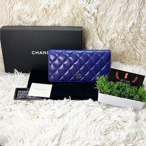 SOLD Authentic Chanel L Yen Bi fold CC quilted wallet in Navy Blue